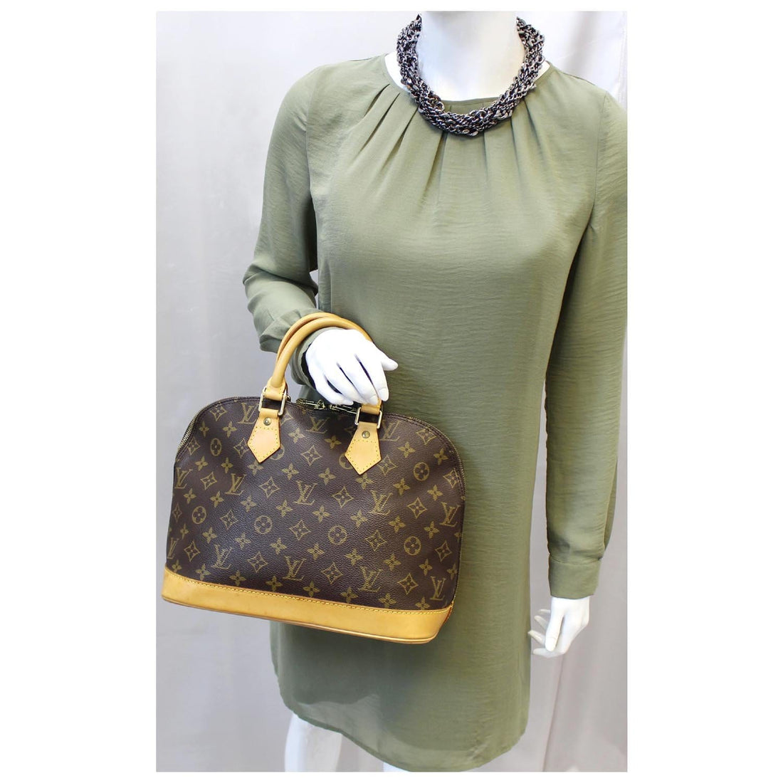 LOUIS VUITTON Alma Monogram Canvas Satchel Bag Brown